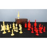 A 19th century stained bone American part set of chess pieces, boxed.
