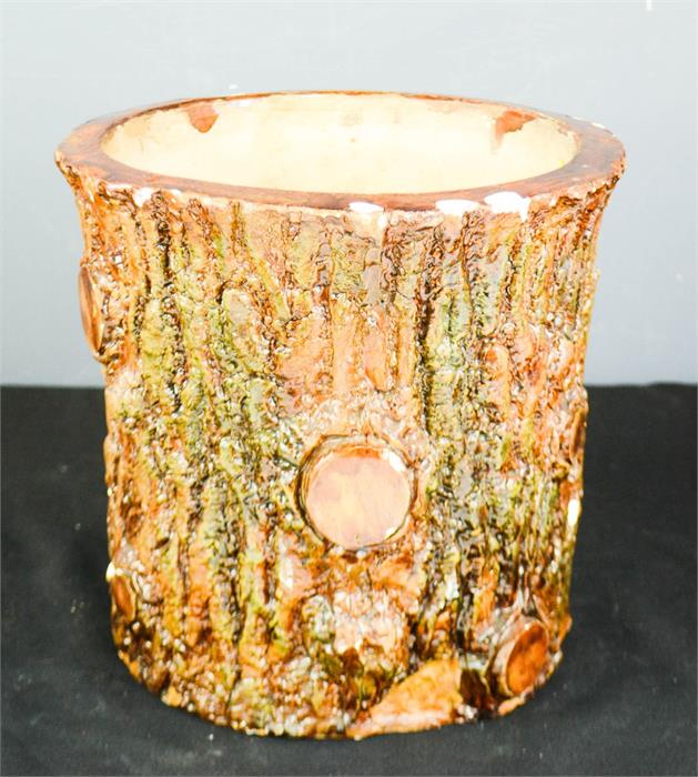 A tree trunk form jardinere, 26cm high, 26cm diameter.