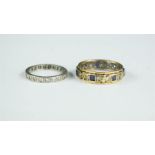 A yellow metal band, set with sapphires, size N, 3.1g, and a white metal ring set with chip