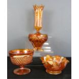 A group of Carnival ware glass.