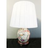 A Chinese ceramic lamp base, ovoid form, cream shade, 46cm overall height.