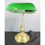 A green shade brass Library desk lamp, together with a three branch ceiling light.