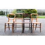 A group of four Edwardian bedroom chairs.