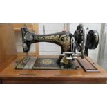 A Frister & Rossman sewing machine,