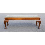 A long footstool with drop in seat. 90 by 32 by 30cm.