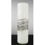 A tall white glass vase with central black decoration, 39cm high.