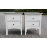 A pair of white M&S bedside tables.