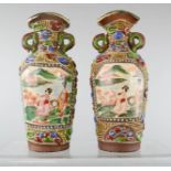 A pair of small Chinese stoneware glazed vases.