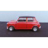 A model Mini in red.