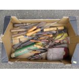 Two boxes containing tools; chisels, tapes, pliers, axe, ruler etc.