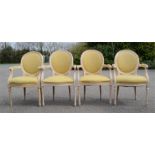 A set of four balloon back French style armchairs.