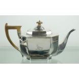 A silver teapot with engraved bird to the front, Sheffield 1927, 21.14oz.