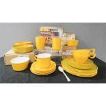 A yellow Melaware set, designed by AH Woodfull; Chief designer at the production company British