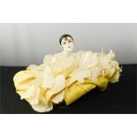 A 1920s Italian porcelain doll, hand painted, in original costume.