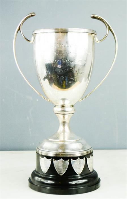 A silver trophy to Isle of Ely Education Committee, London 1927, 17.23toz, the ebonised base bearing