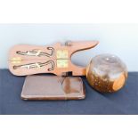 A Krinton cigar case, treen boot pull holder, and a lignum vitae bowl made by A G Spalding & Bros,