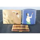 Three Art Deco period cigarette cases / compacts.