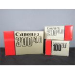 Canon photographic equipment: Lens FD100/2.8, Lens FD200/4.0, FD 300/4.0, all boxed.