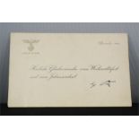 A Christmas card printed signature by Adolf Hitler.