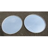 Three circular white painted metal wall mirrors [Provenance: Ken Kirkwood Collection]