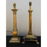 Two brass table lamps in the form of columns.