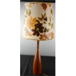A teak 1960s table lamp and shade.