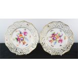 A pair of Bavarian porcelain plates, with pierced borders, 21cm diameter.