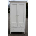 A white M&S wardrobe with two drawers.