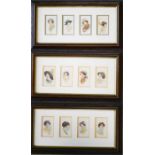 A group of three framed cigarette card collections.