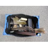 A box of tools, saws,plastering tools, sharpening stone etc.
