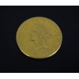 A USA 1897 Ten Dollars, eagle, 900 (21ct gold) 16.71g, 27mm diameter.