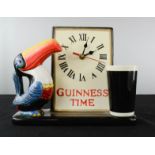 A Vintage Guinness Time ceramic clock.