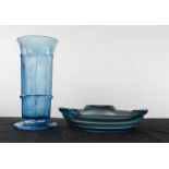 A blue glass vase and matching dish, with purple swirl.