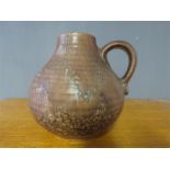 A Studio pottery stone glazed jug with incised mark to base, together with a clay bodied studio