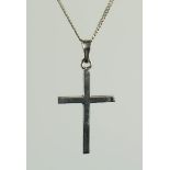 A 9ct white gold crucifix pendant and chain.