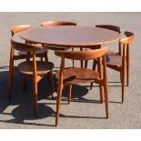 A set of Danmark FH dining chairs and table.120cm diameter, 70cm high.