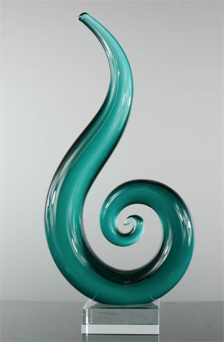 A glass modern table sculpture.