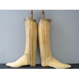 A pair of Riding boot trees, possibly to fit a size 9 boot, four part sectional.