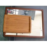 A teak tray and similar style mirror.