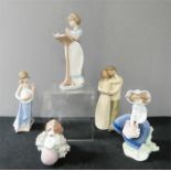 A Lladro group of figures, and others, all boxed.