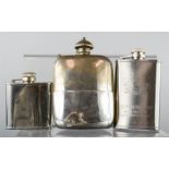 A silver plated hip flask, whisky flask and another. (3)