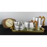 A Piquot ware tea set, Retro clock and tray.