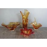 DESIGN SALE - A group of kitch orange coloured glassware including a hankerchief vase, two dishes