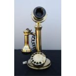 A candlestick phone.