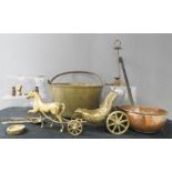 A group of brassware including weights, jam pan, horse and cart, copper pan, parafin lamp base etc.