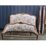 A French demi-corbeille double bed, upholstered head and foot boards, including side rails.