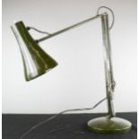 An olive green anglepoise lamp.