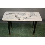 A 1950s vintage retro Jazz formica table with musical instruments in the Fornasetti style to the
