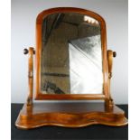 A Victorian mahogany toilet mirror.