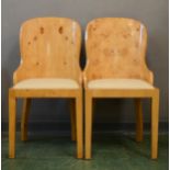 A pair of Art Deco burr walnut desk chairs.